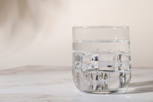 A glass of water with ice