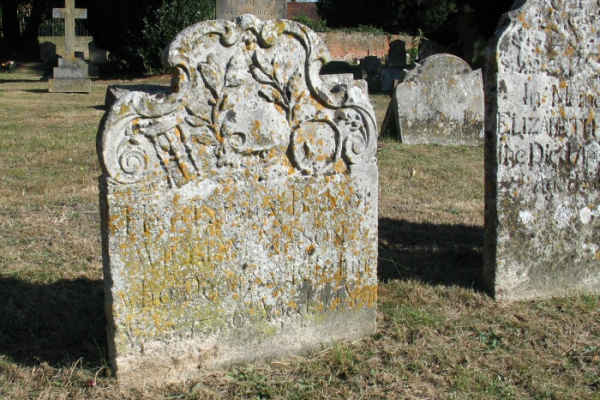 Gravestone with skull