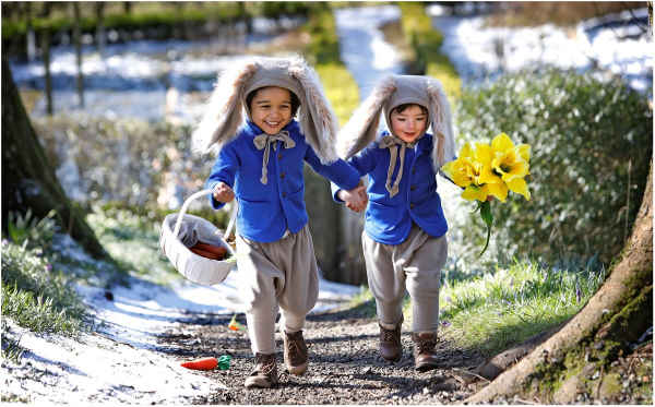 Two children dressed as rabbits