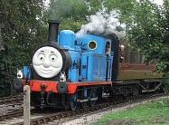 Thomas steams into the station